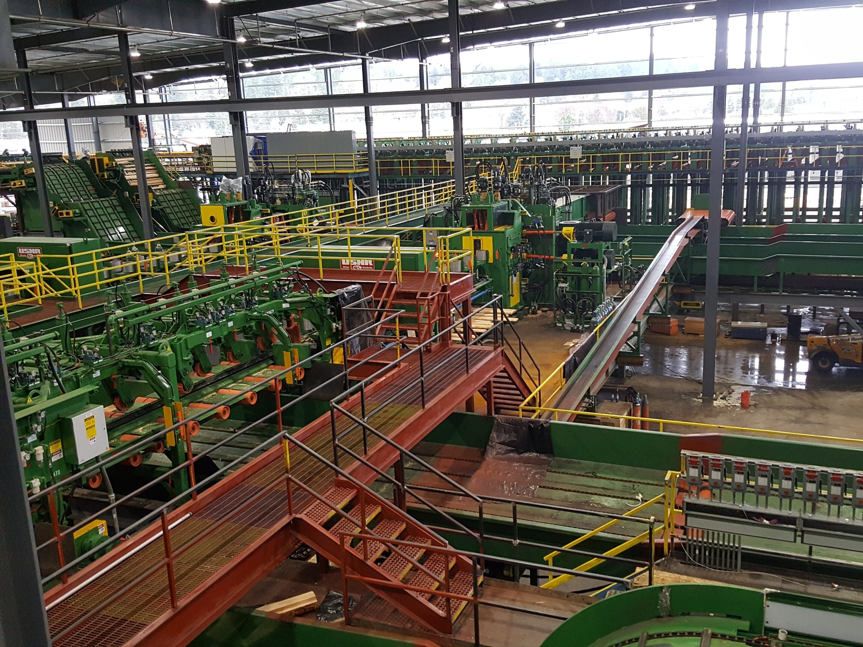 A large factory with many machines and plants