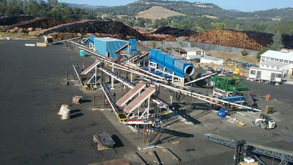 A large industrial area with many conveyors and other equipment.